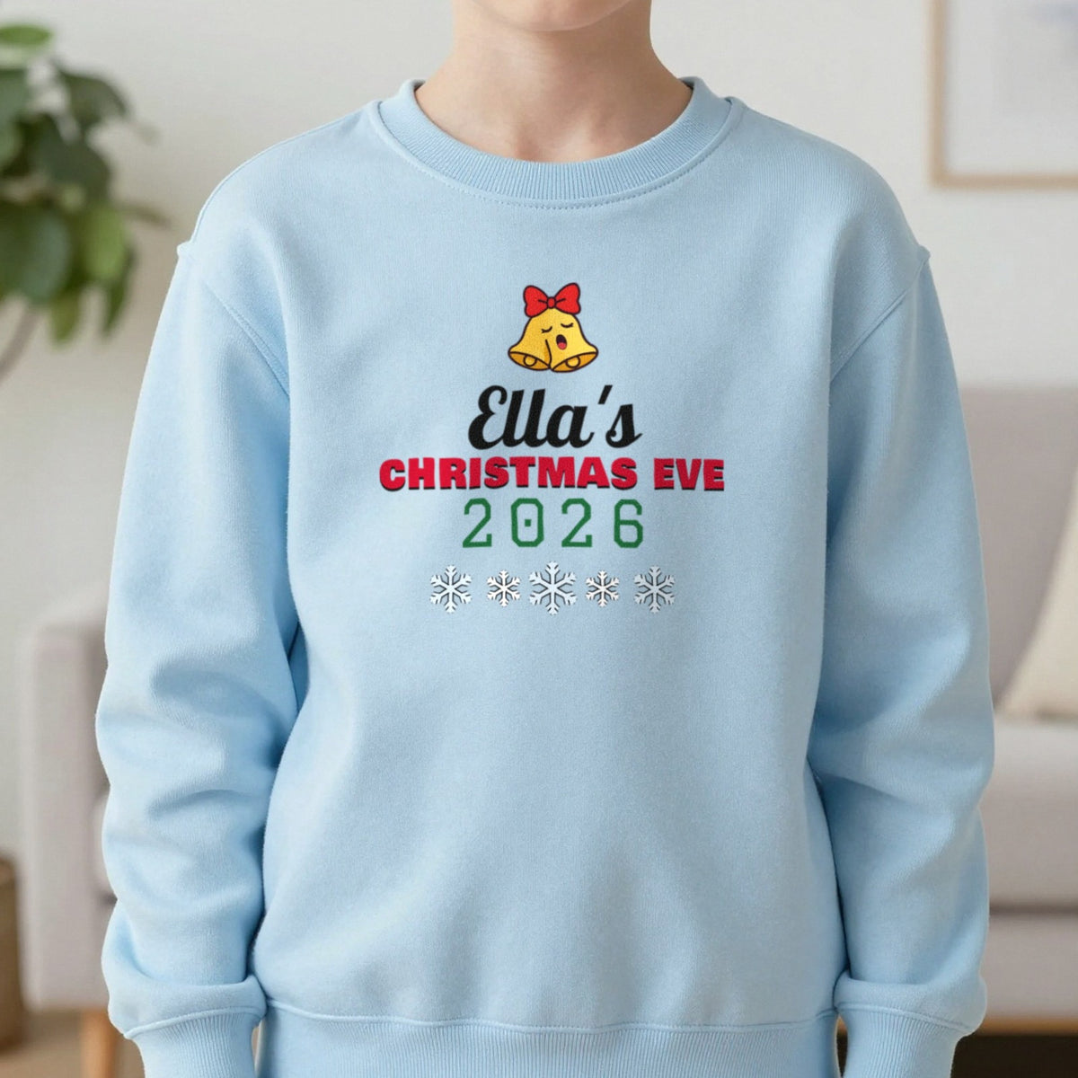 Kids Personalised Christmas Eve T-Shirt Sweatshirt in Light Blue, worn, our photo