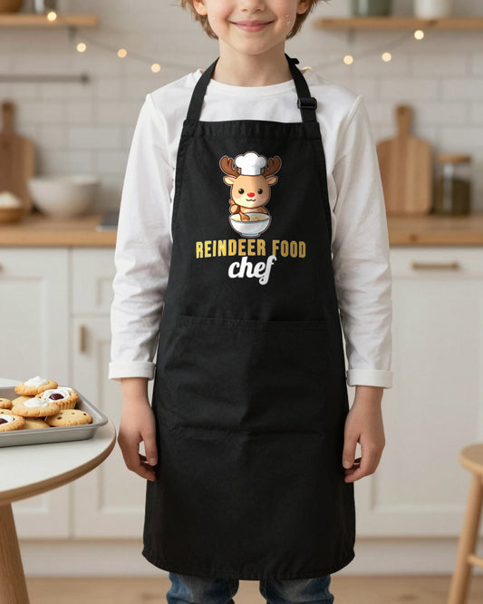 Reindeer Food Chef kids apron in Black, worn, our photo