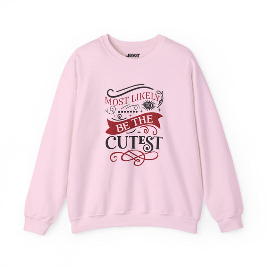 light pink sweatshirt with most likely to be the cutest christmas slogan — cute christmas gift idea