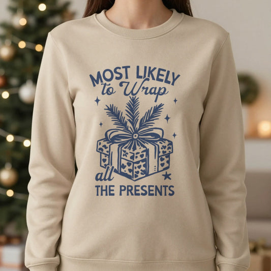 Most Likely To Wrap All The Presents Christmas Sweatshirt in Sand, worn, our photo