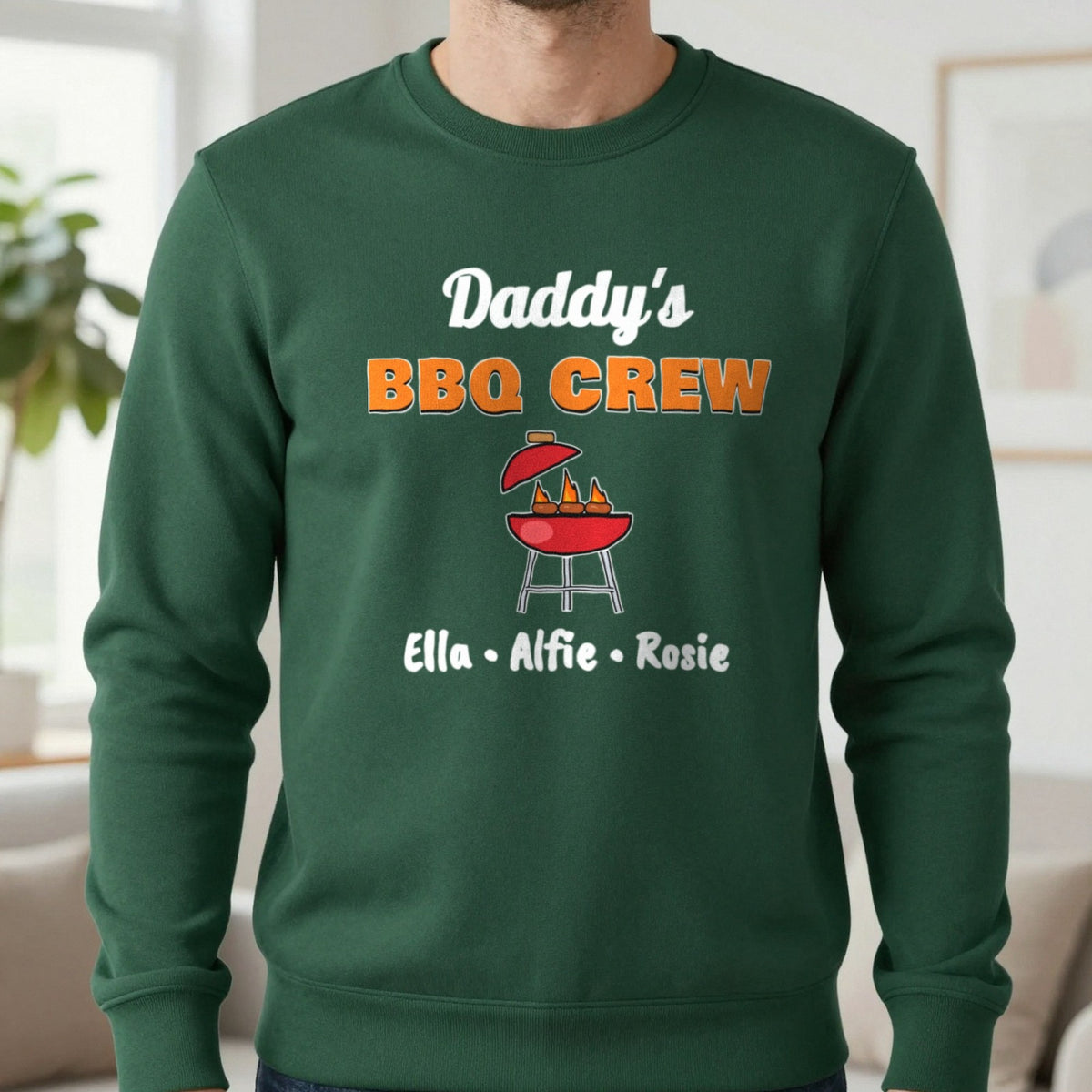 Personalised Daddy's BBQ Crew T-Shirt & Sweatshirt Sweatshirt in Forest Green, worn, our photo