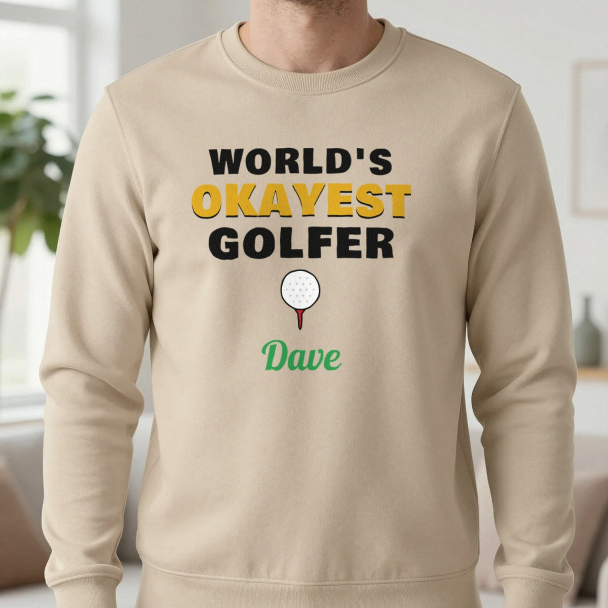 Personalised World's Okayest Golfer T-Shirt & Sweatshirt Sweatshirt in Sand, worn, our photo