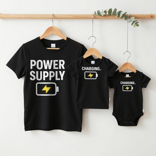 Power Supply & Charging grown-up tee, kids tee and baby grow on hangers