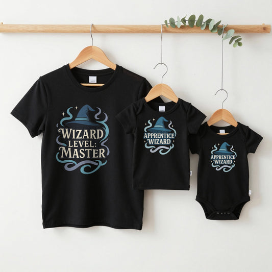 Wizard Master & Apprentice grown-up tee, kids tee and baby grow on hangers
