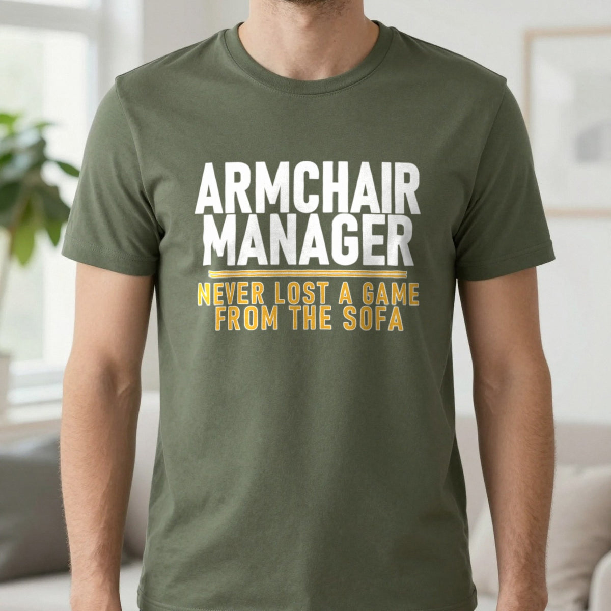 Armchair Manager Never Lost A Game From The Sofa Funny Football T-Shirt & Sweatshirt in Military Green, worn, our photo