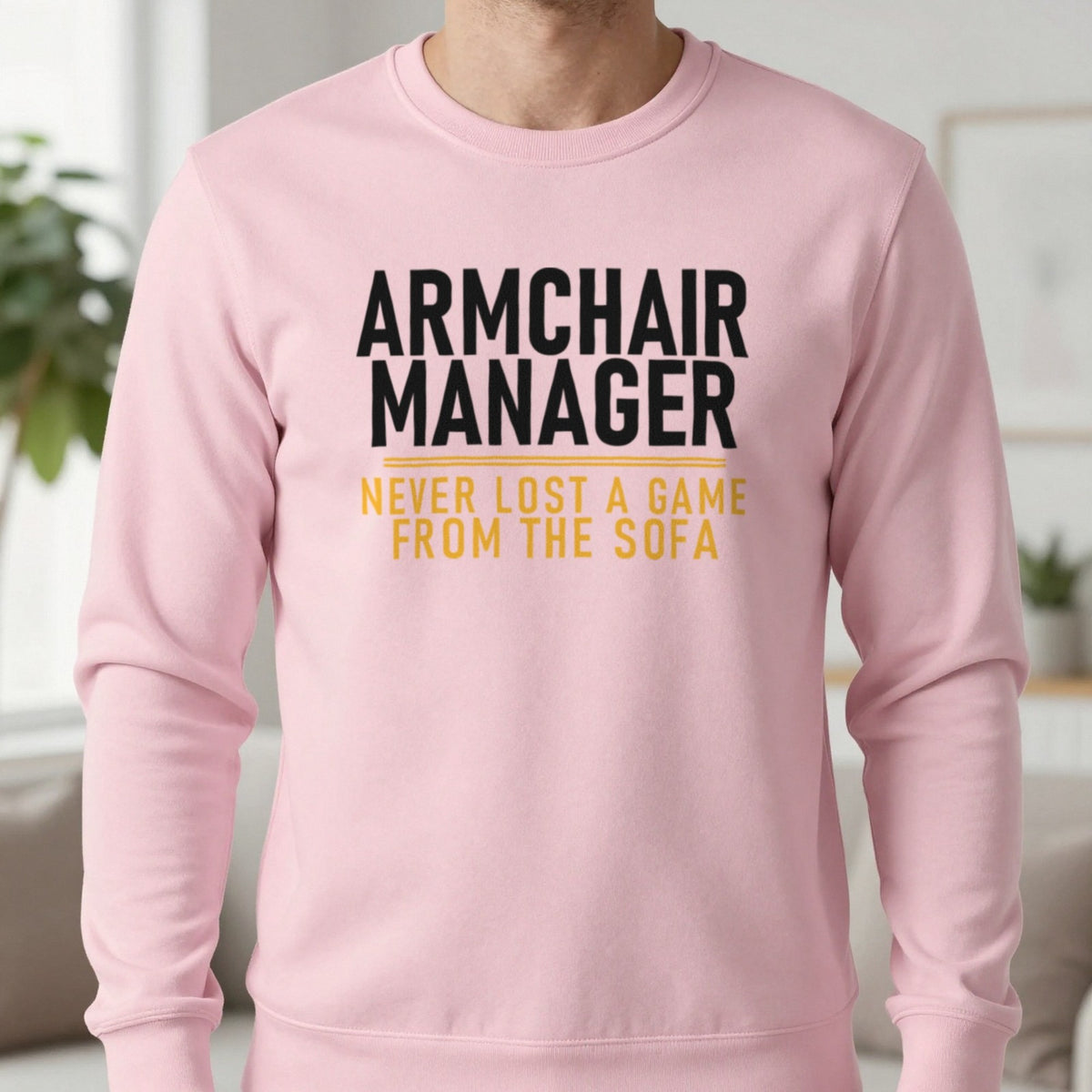 Armchair Manager Never Lost A Game From The Sofa Funny Football T-Shirt & Sweatshirt in Light Pink, worn, our photo