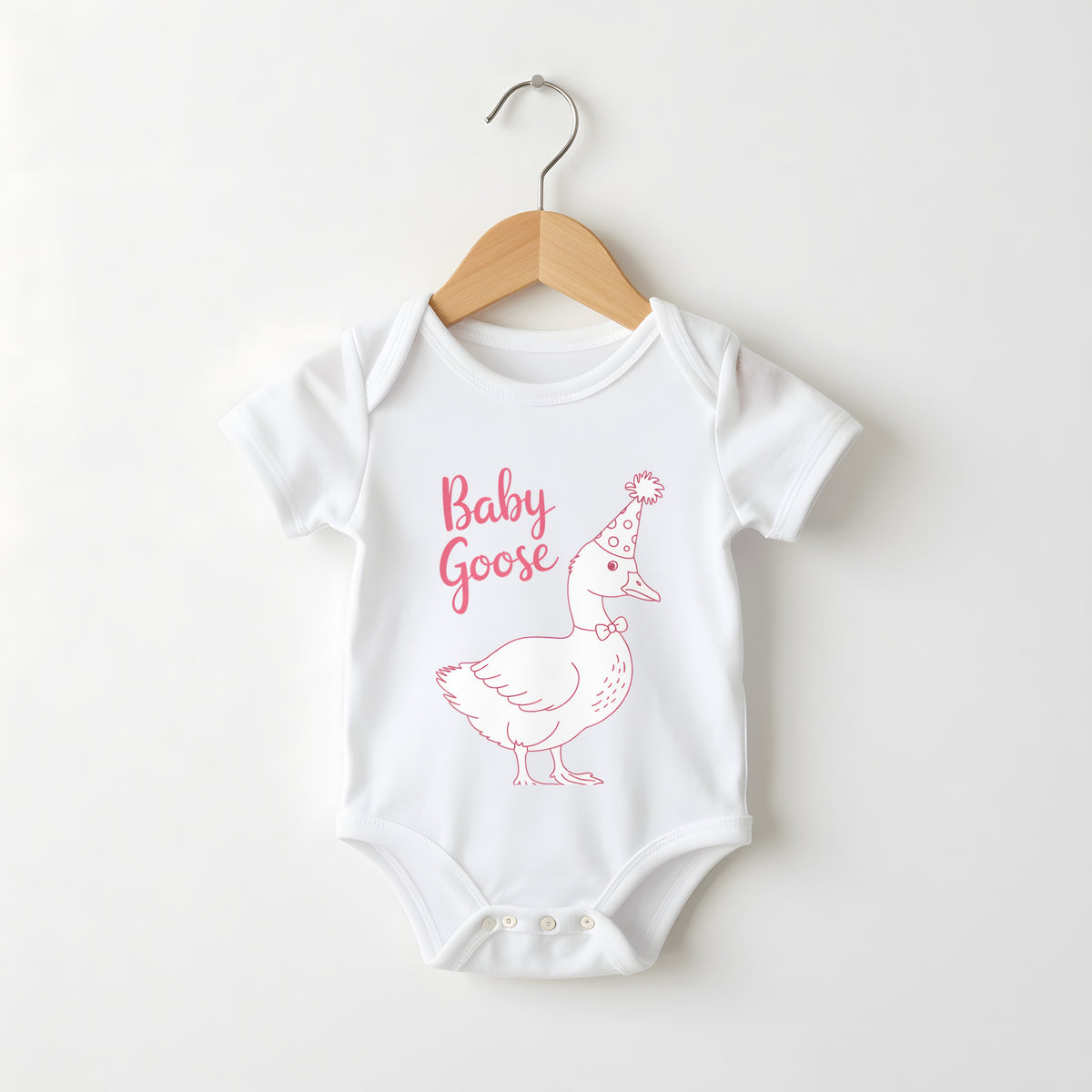 Baby Goose white baby grow on a hanger