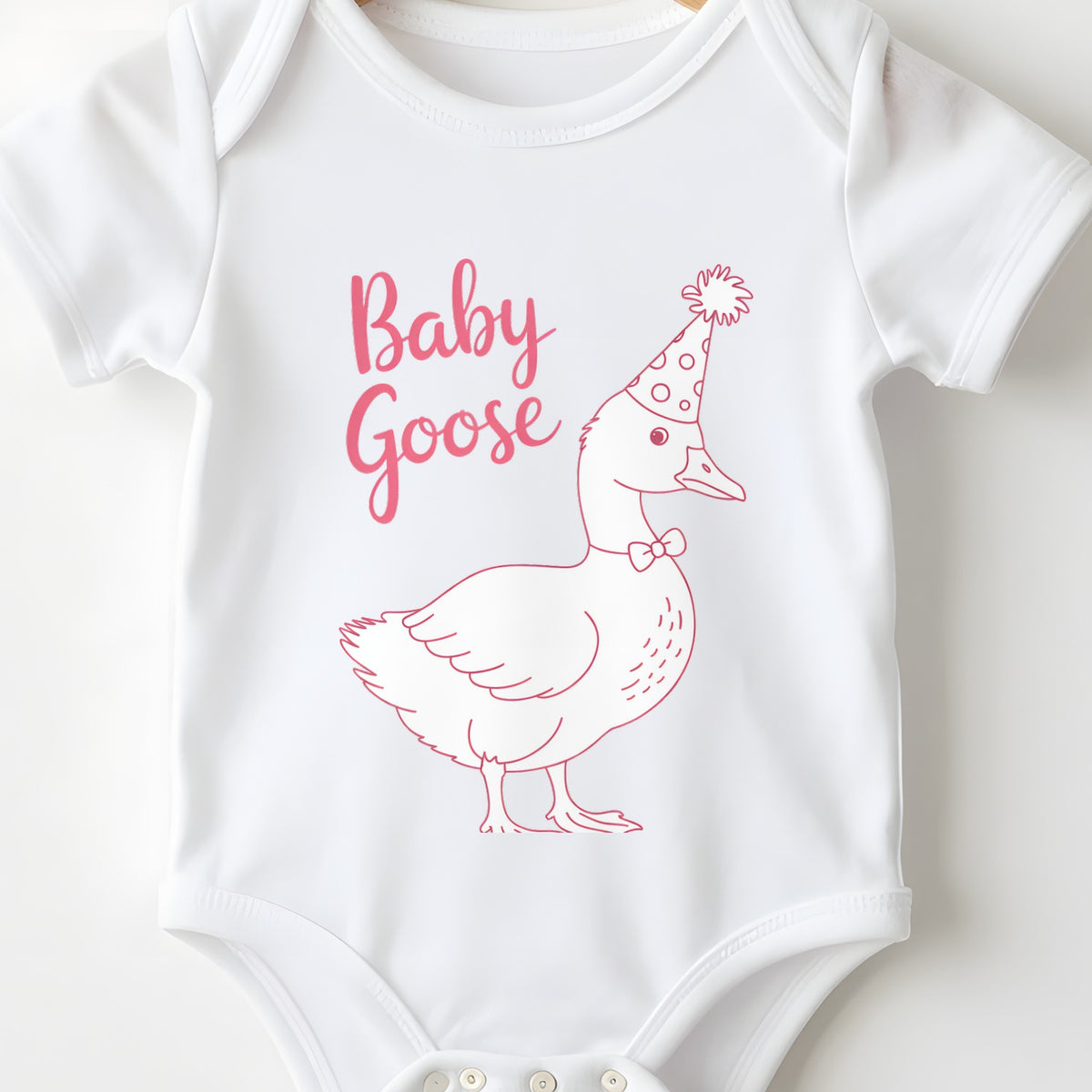Baby Goose baby grow print close-up