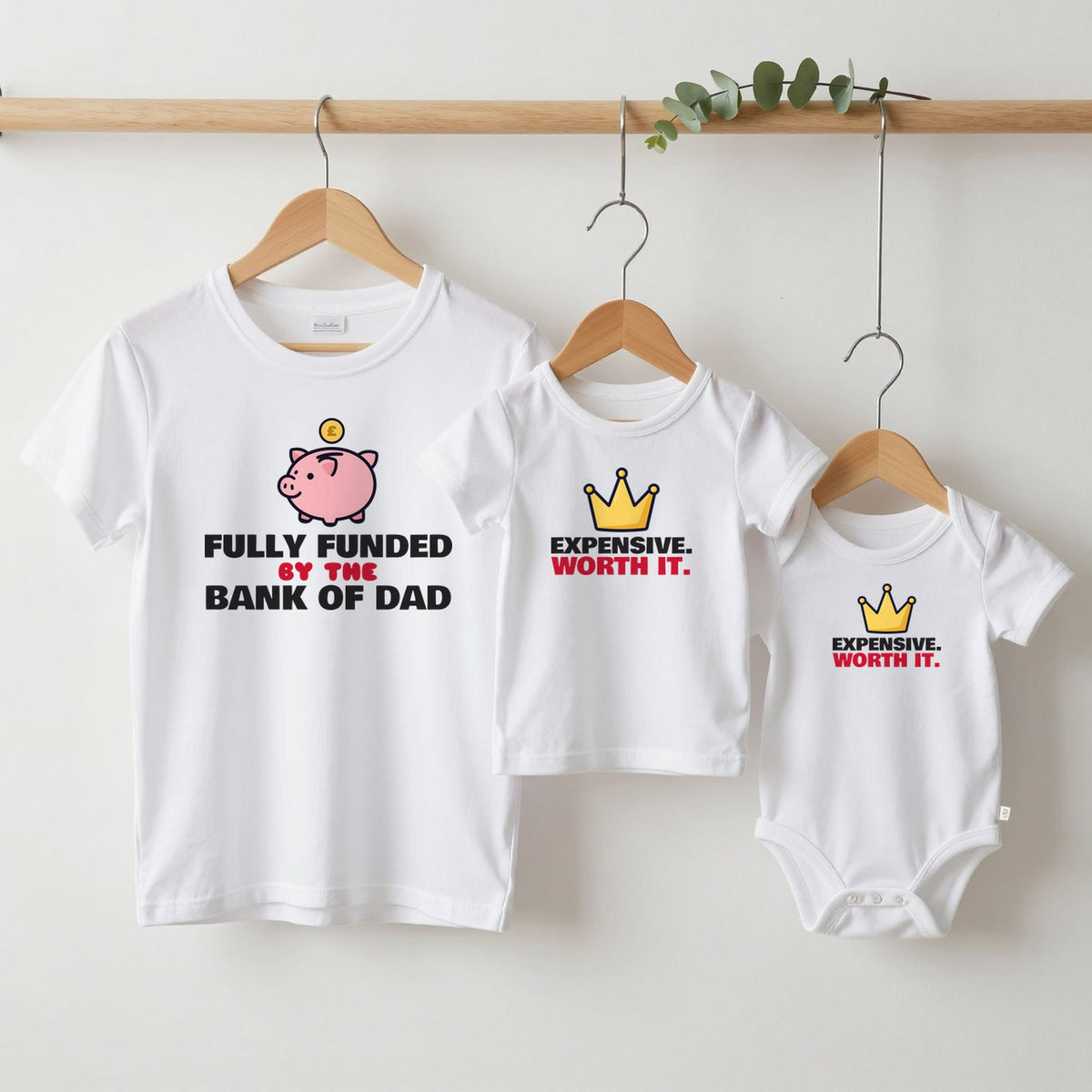 Bank of Dad & Expensive Worth It matching set grown-up tee, kids tee and baby grow on hangers