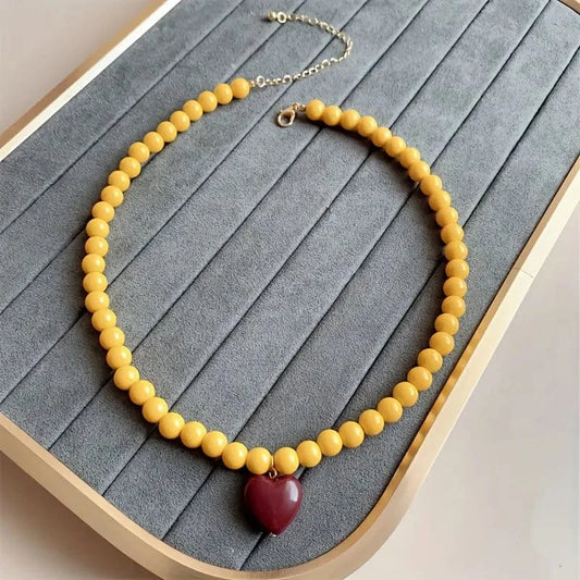 yellow beaded heart necklace with burgundy resin pendant boho gift for her