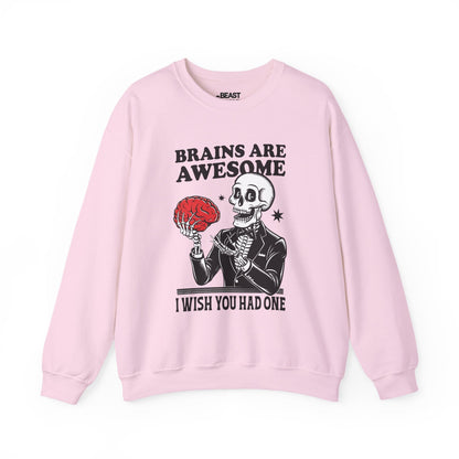 light pink sweatshirt with brains are awesome skeleton halloween graphic for spooky season