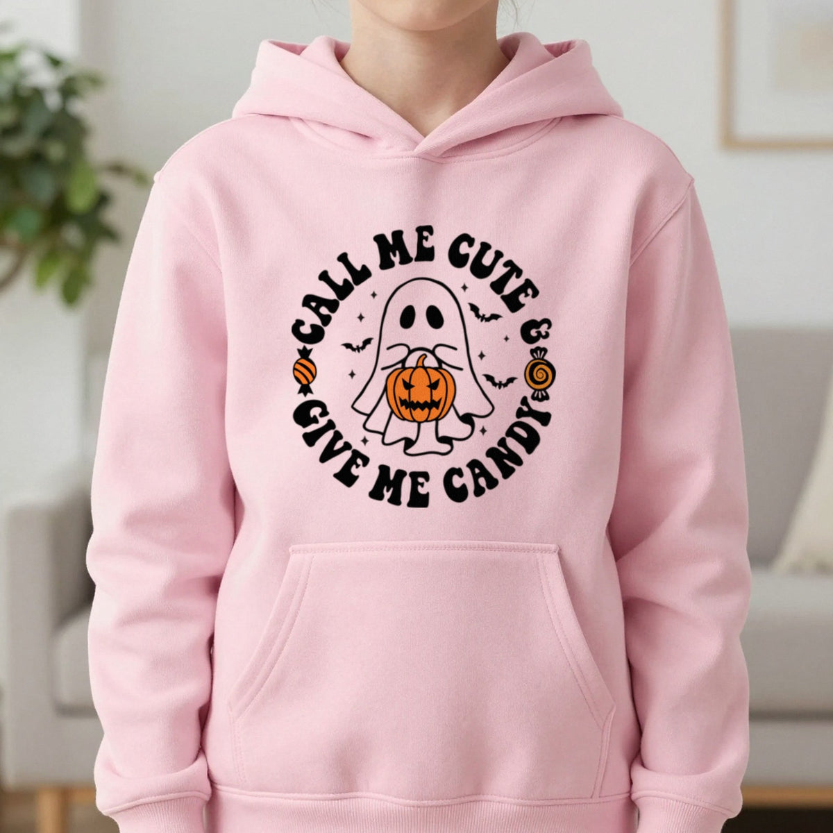 Call Me Cute Give Me Candy Halloween Kids Hoodie in Light Pink, worn, our photo