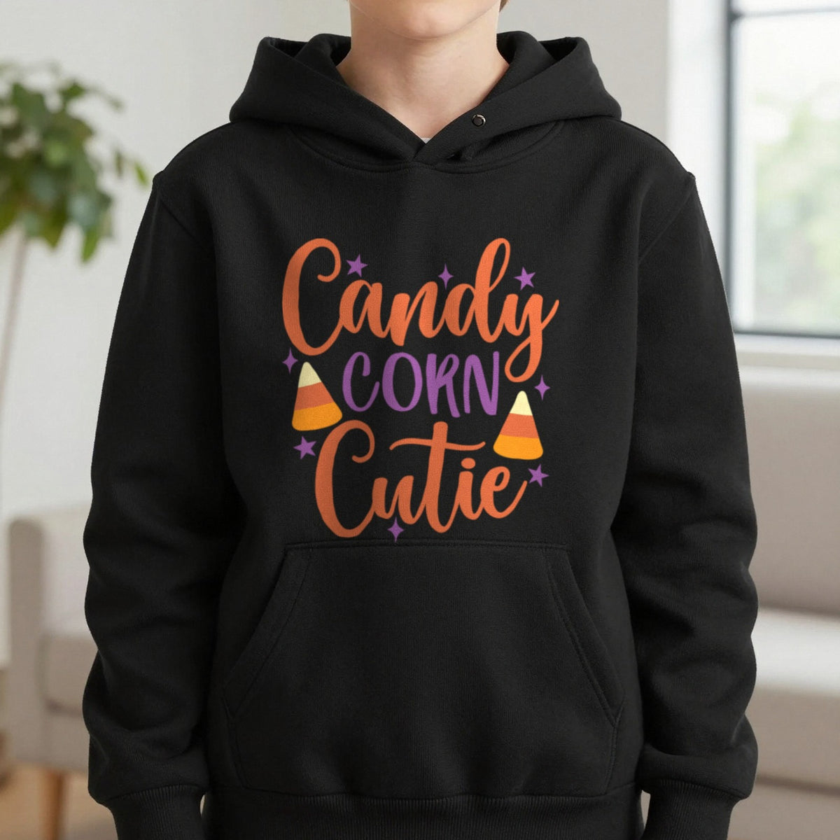 Candy Corn Cutie Halloween Kids Hoodie in Black, worn, our photo