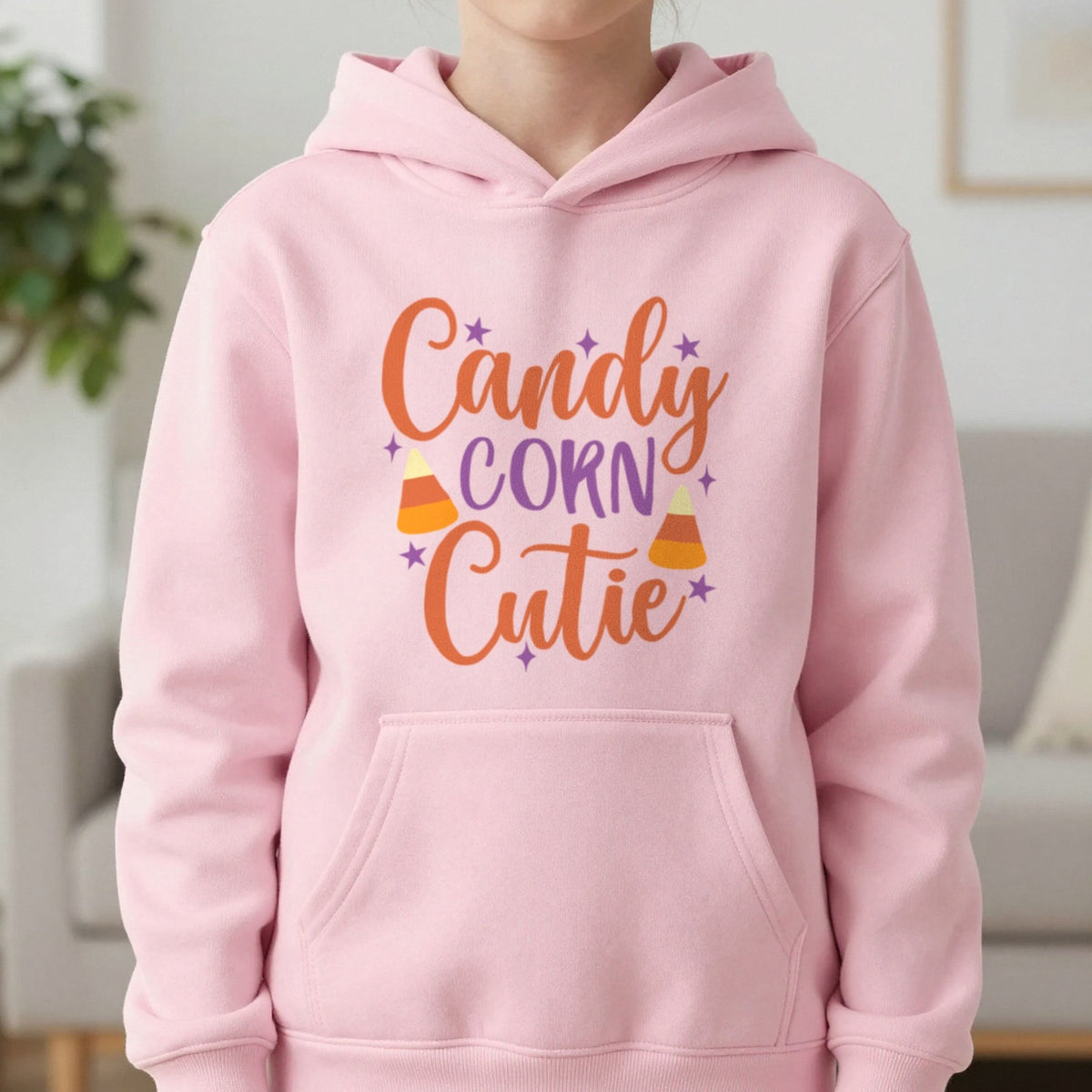 Candy Corn Cutie Halloween Kids Hoodie in Light Pink, worn, our photo
