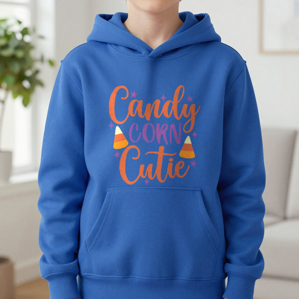 Candy Corn Cutie Halloween Kids Hoodie in Royal, worn, our photo