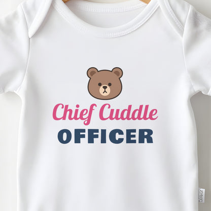 Chief Cuddle Officer baby grow print close-up