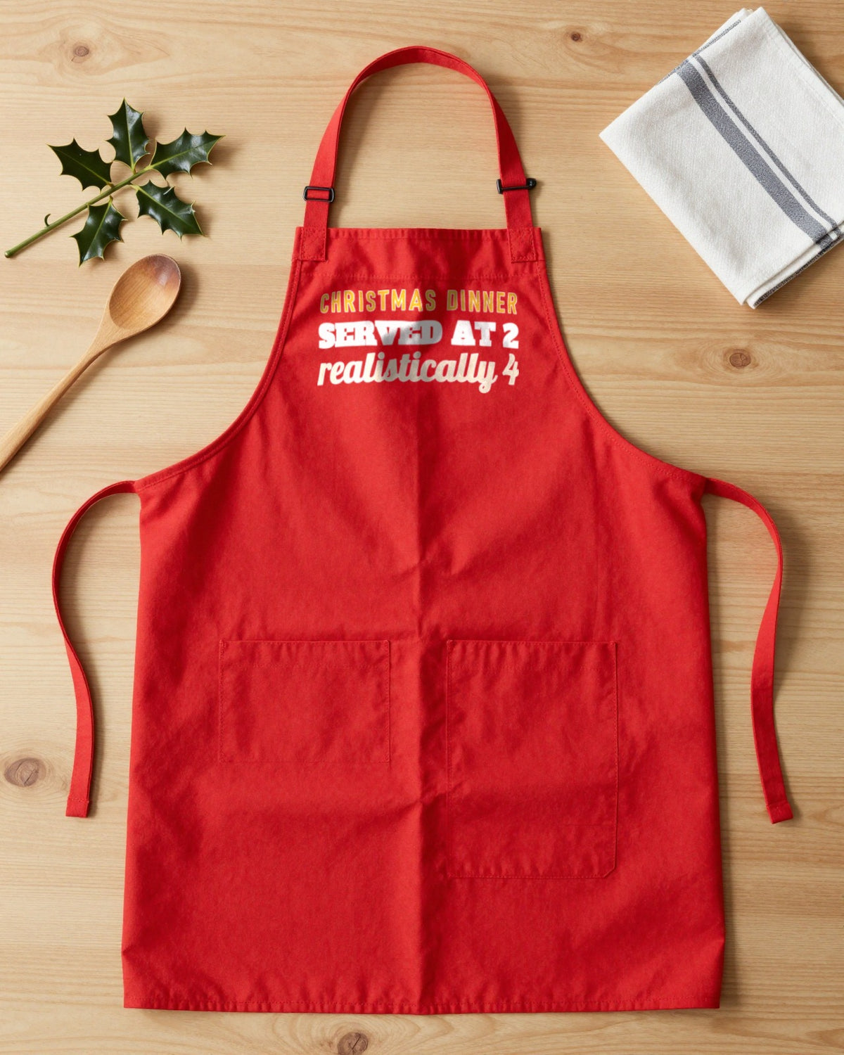 Christmas Dinner Served At 2 Realistically 4 Christmas apron laid flat