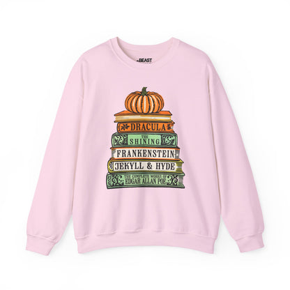 light pink sweatshirt with classic horror books spooky season design