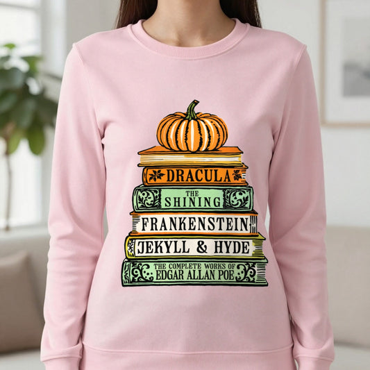 Classic Horror Books Halloween Sweatshirt in Light Pink, worn, our photo