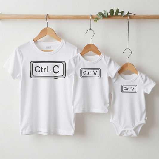 Copy & Paste grown-up tee, kids tee and baby grow on hangers