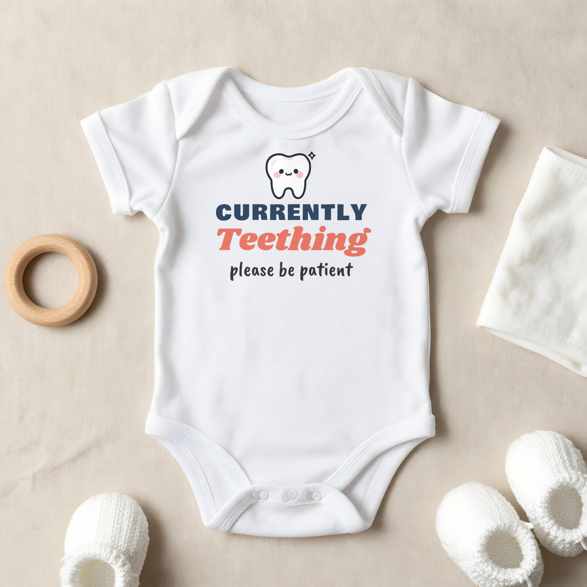 Currently Teething baby grow laid flat