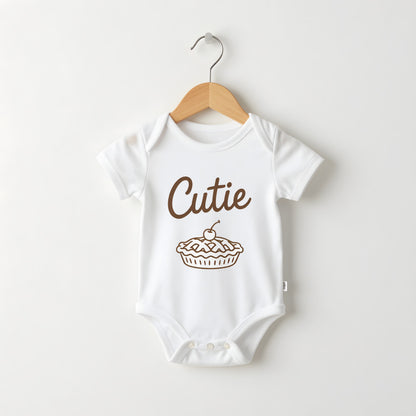Cutie Pie white baby grow on a hanger