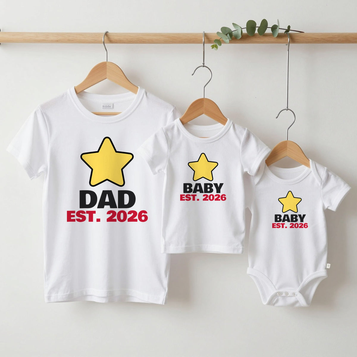 Dad Est. 2026 & Baby Est. 2026 New Dad matching set grown-up tee, kids tee and baby grow on hangers