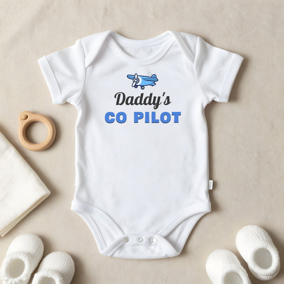 Daddy's Co-Pilot baby grow laid flat