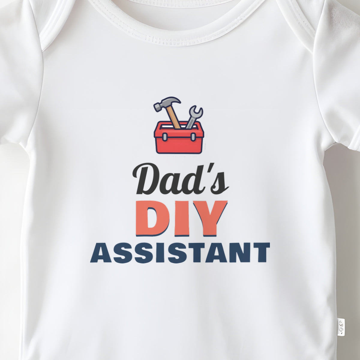 Dad's DIY Assistant baby grow print close-up
