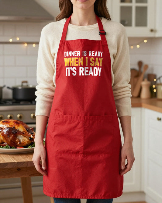 Dinner Is Ready When I Say It Is Ready Christmas apron in Red, worn, our photo
