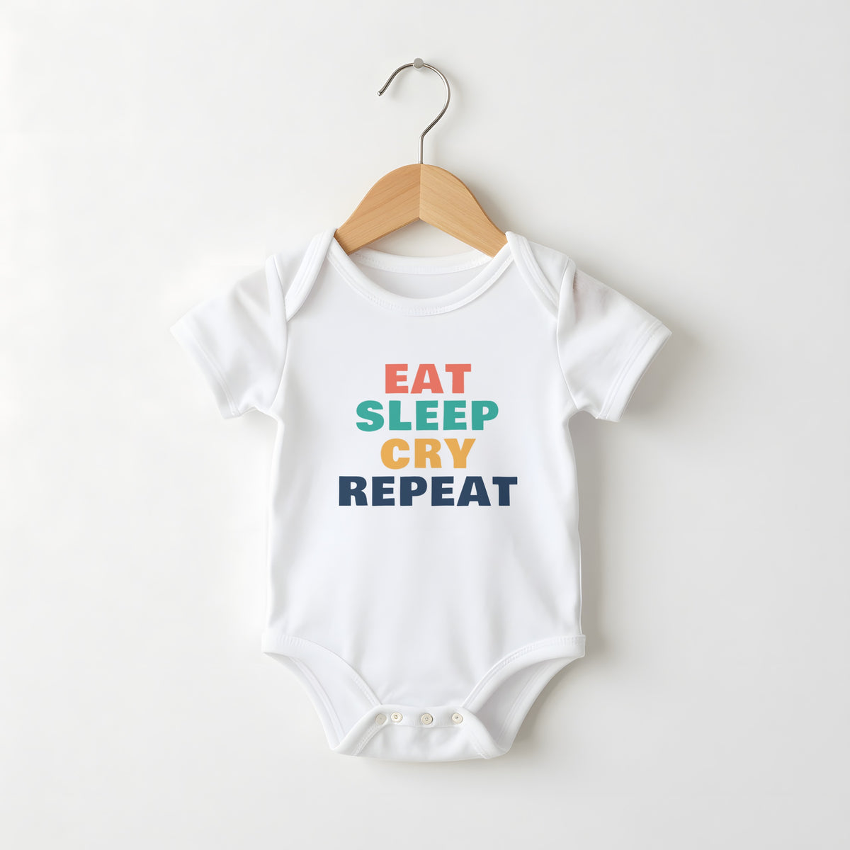 Eat Sleep Cry Repeat white baby grow on a hanger