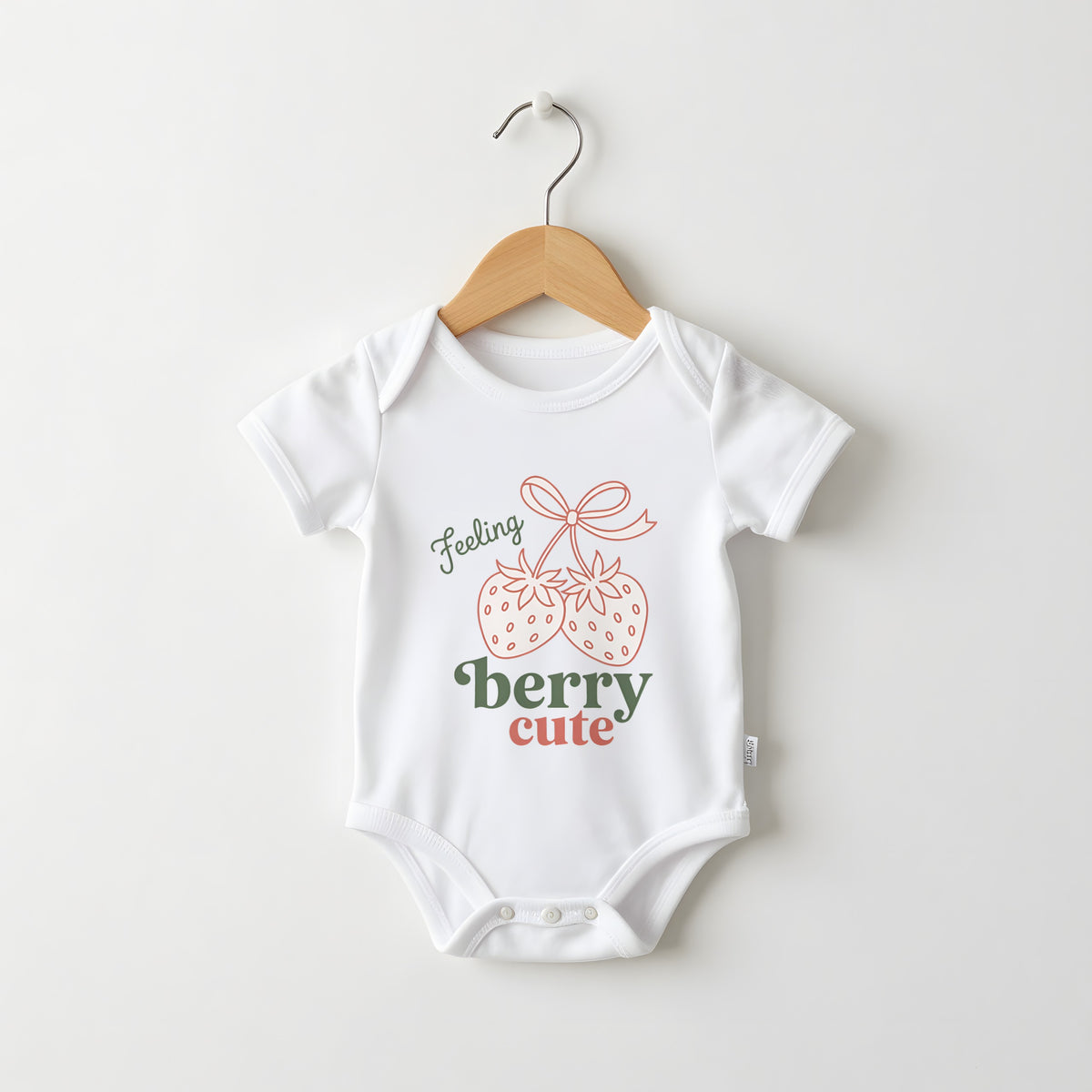 Feeling Berry Cute white baby grow on a hanger