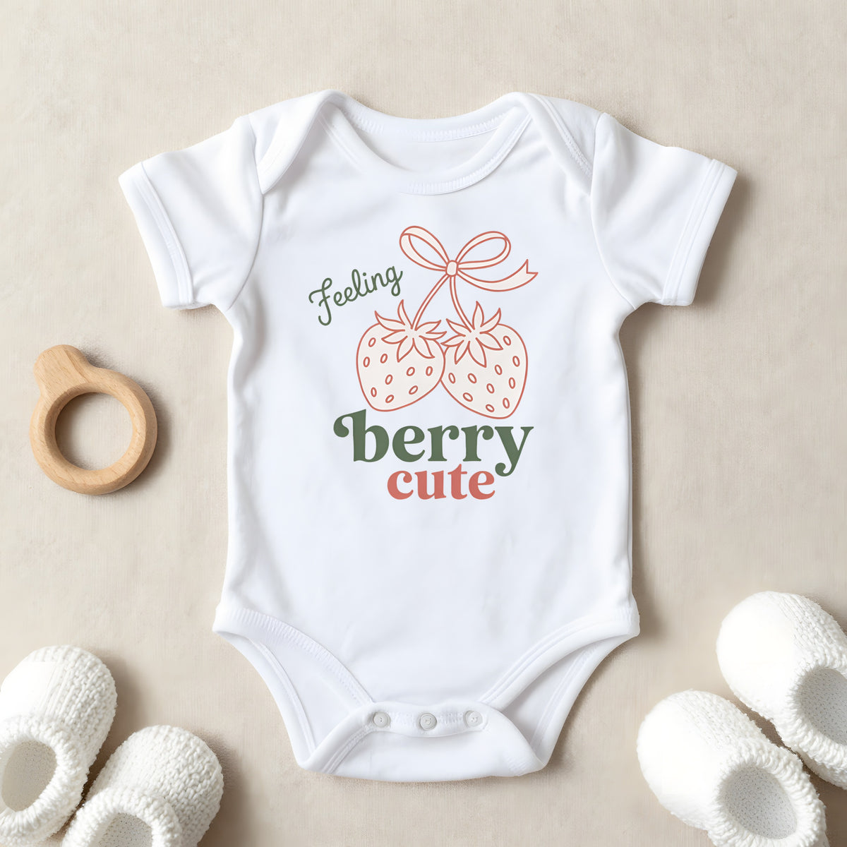 Feeling Berry Cute baby grow laid flat
