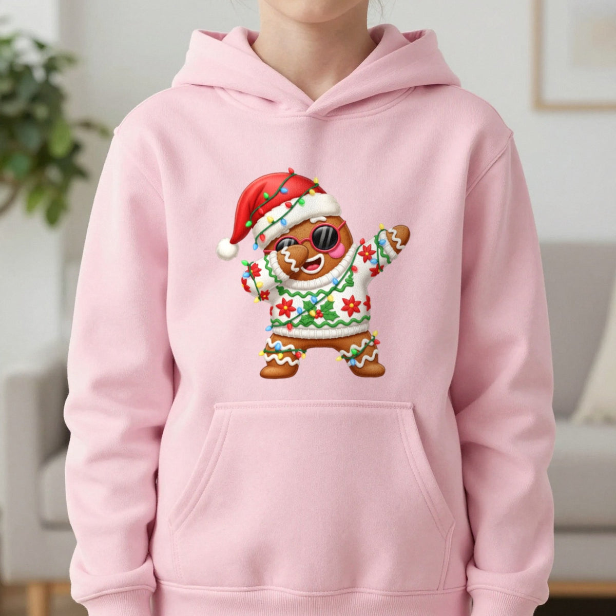 Gingerbread Dab Christmas Kids Hoodie in Light Pink, worn, our photo