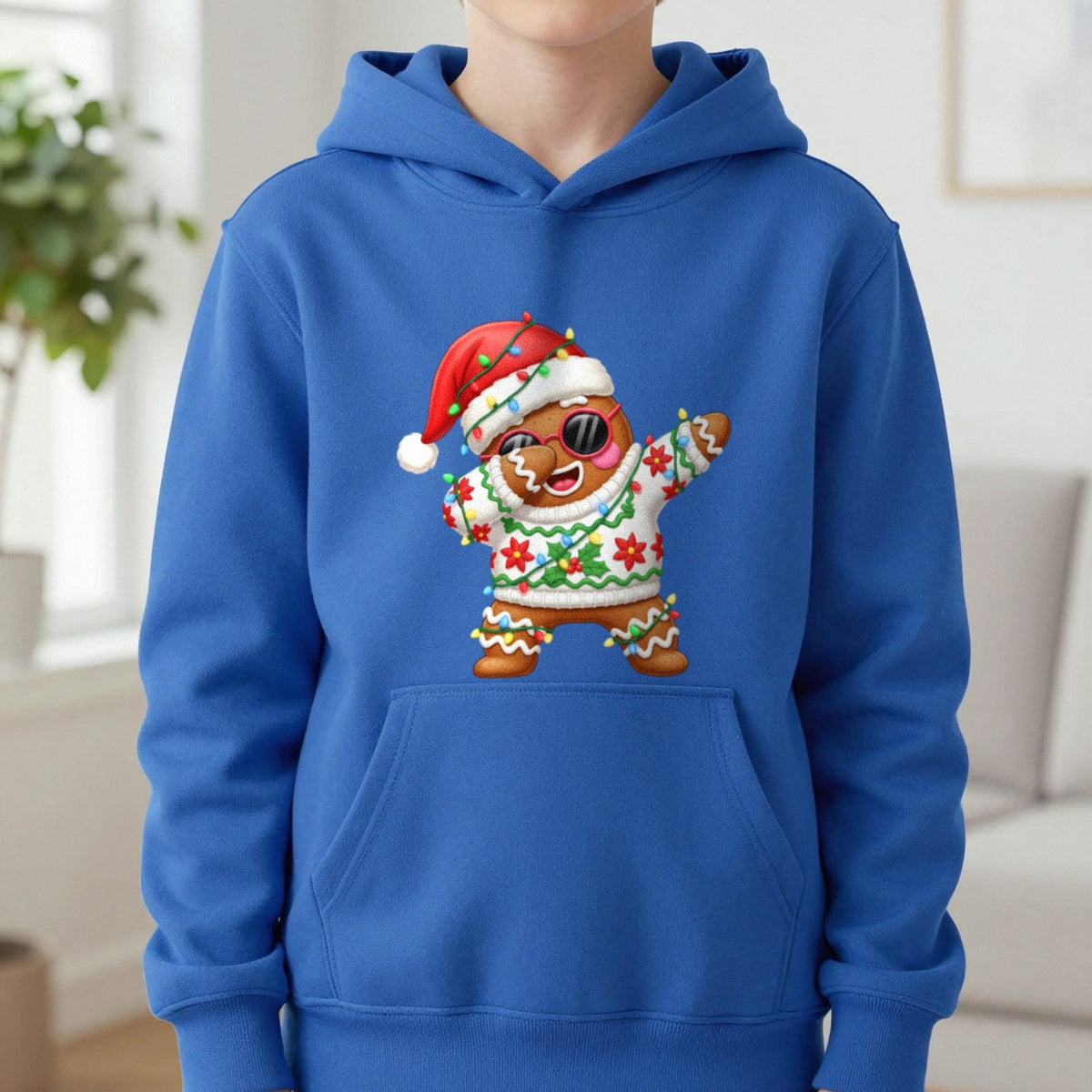 Gingerbread Dab Christmas Kids Hoodie in Royal, worn, our photo