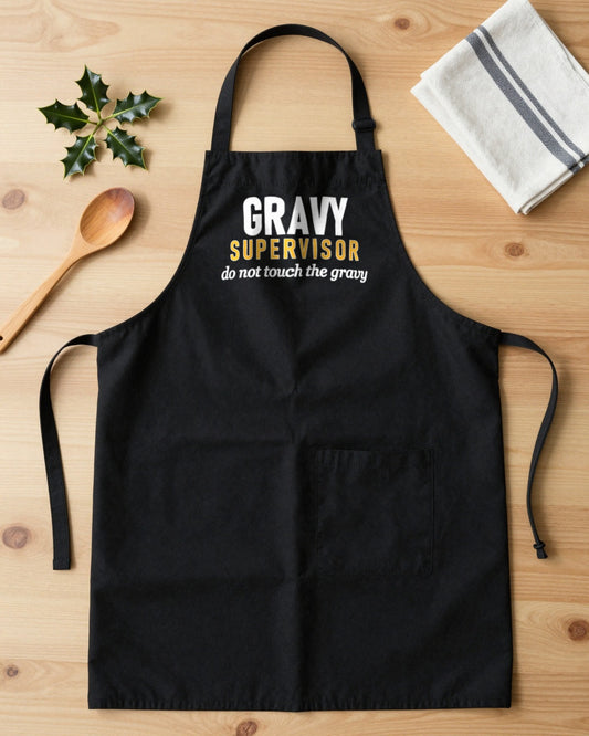 Gravy Supervisor Do Not Touch The Gravy Christmas apron laid flat