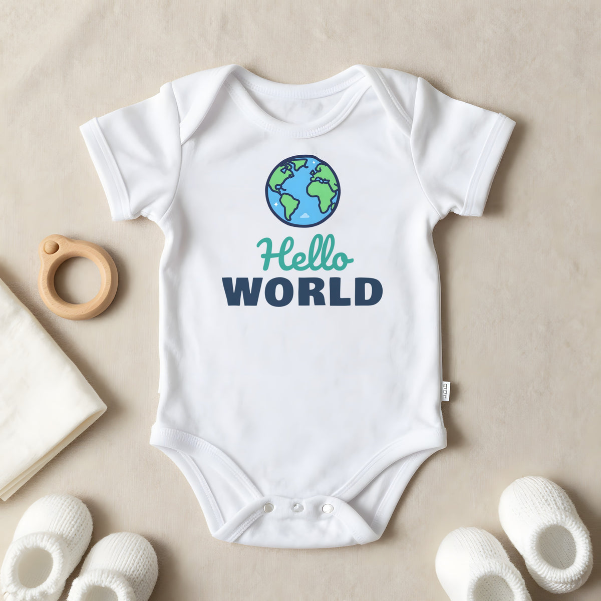 Hello World baby grow laid flat