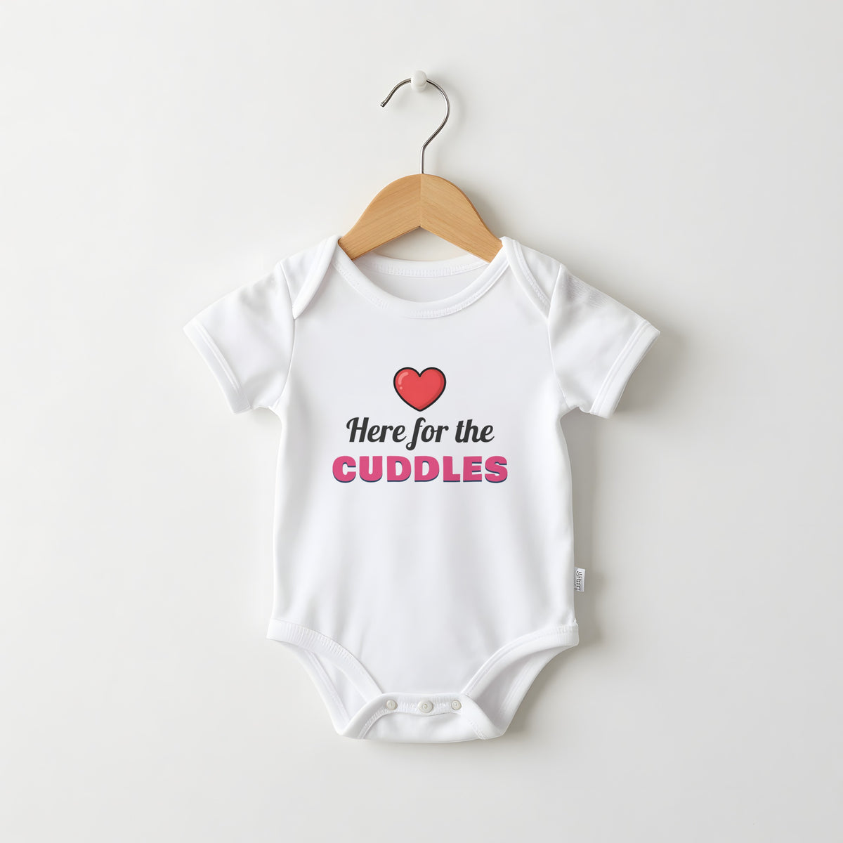 Here For The Cuddles white baby grow on a hanger