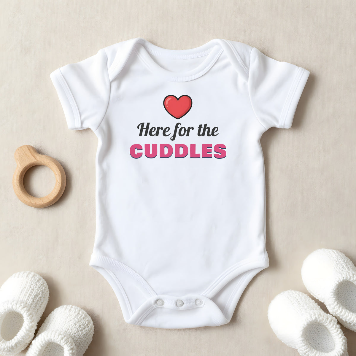 Here For The Cuddles baby grow laid flat
