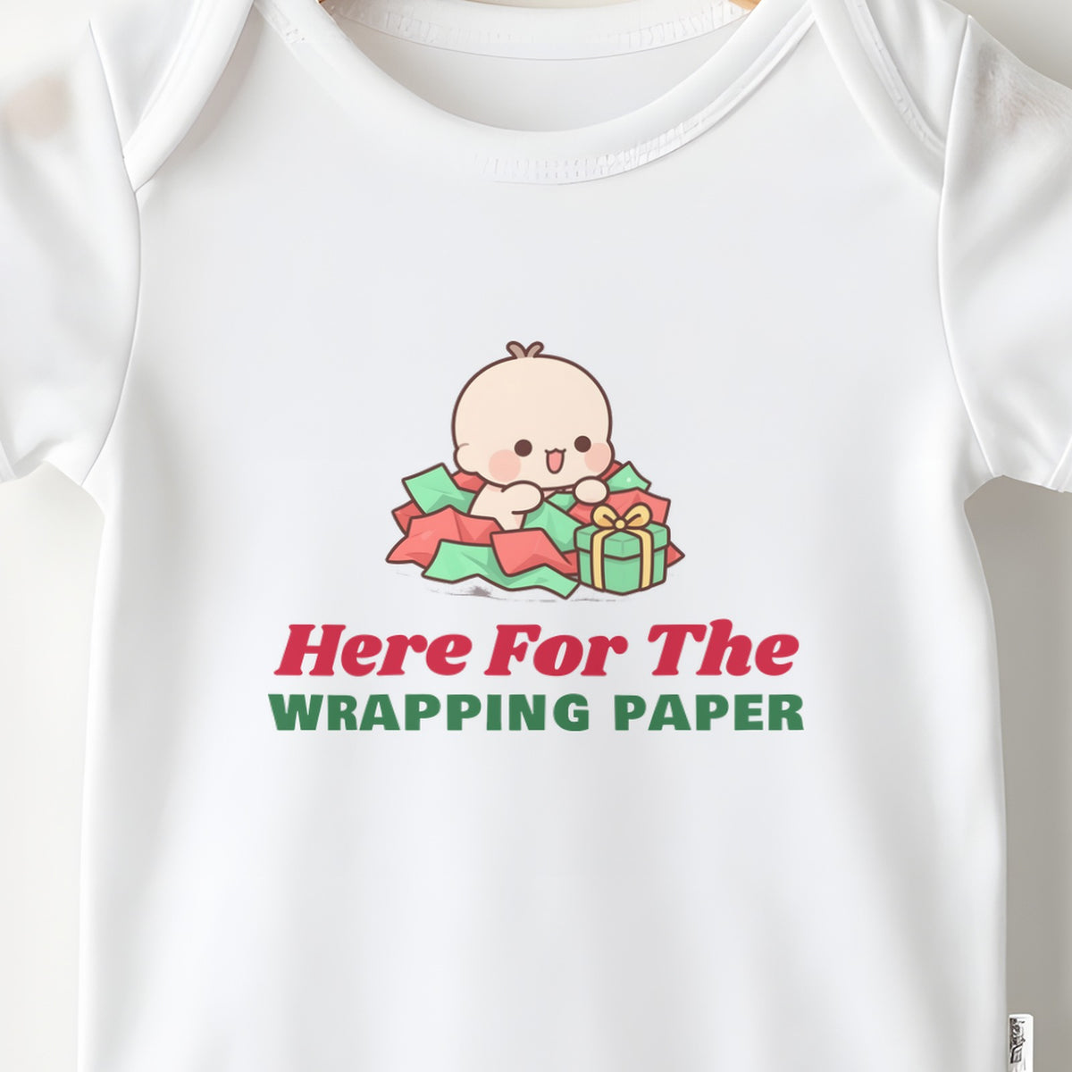 Here For The Wrapping Paper baby grow print close-up