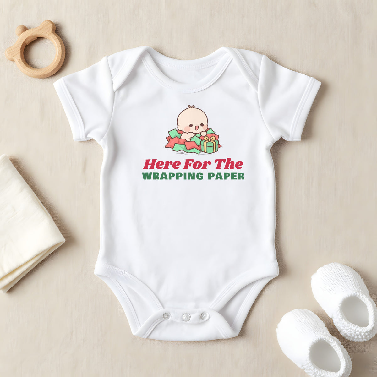 Here For The Wrapping Paper baby grow laid flat