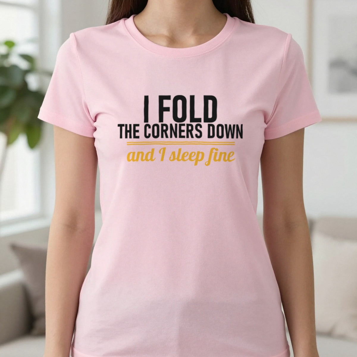 I Fold The Corners Down And I Sleep Fine Funny T-Shirt & Sweatshirt in Light Pink, worn, our photo
