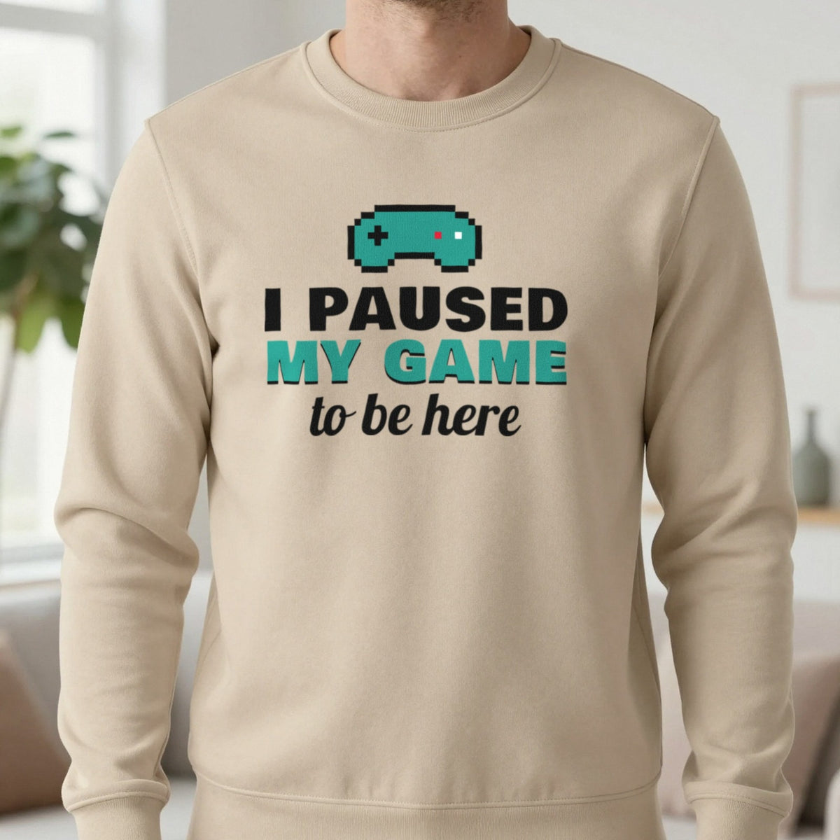 I Paused My Game To Be Here Funny Gaming T-Shirt & Sweatshirt in Sand (Sweatshirt), worn, our photo