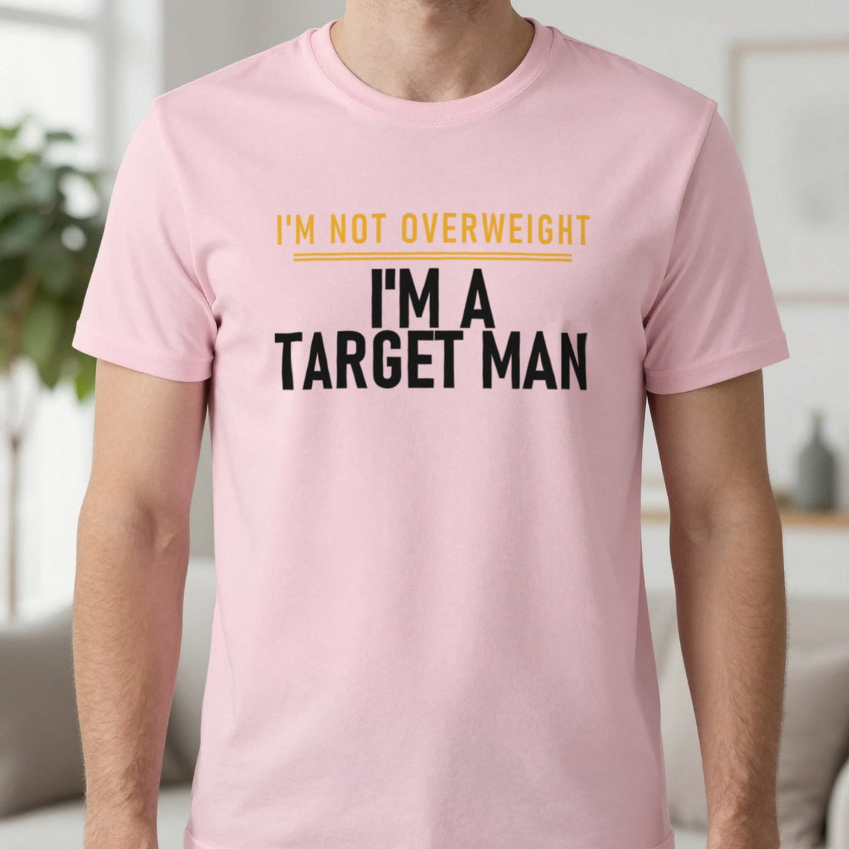 I'm Not Overweight I'm A Target Man Funny Football T-Shirt & Sweatshirt in Light Pink, worn, our photo