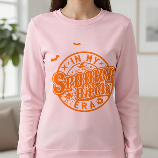In My Spooky Bitch Era Halloween Sweatshirt in Light Pink, worn, our photo