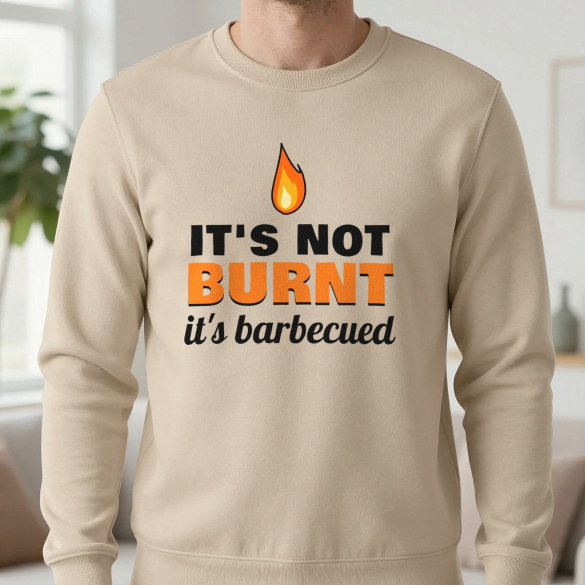 It's Not Burnt It's Barbecued Funny BBQ T-Shirt & Sweatshirt in Sand (Sweatshirt), worn, our photo