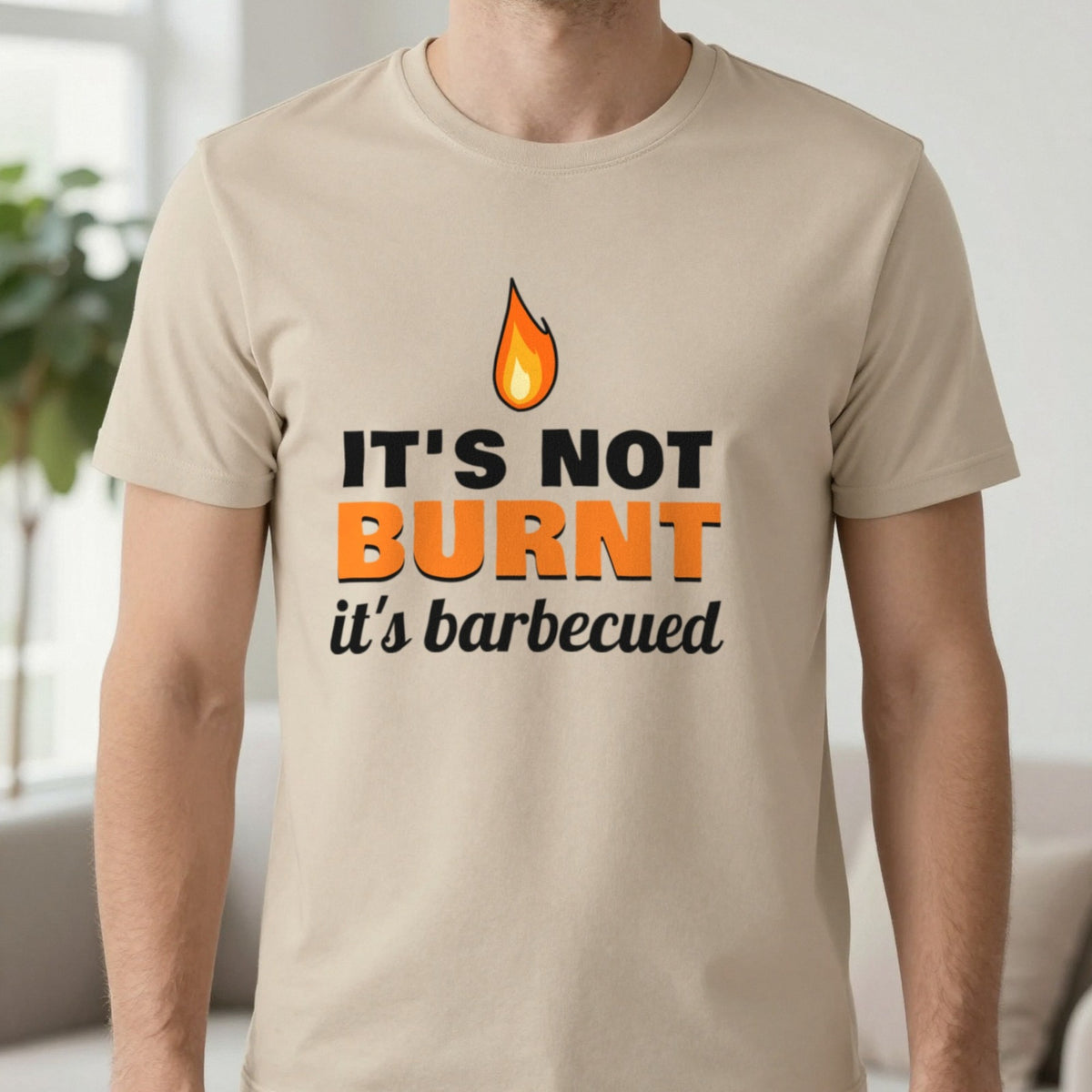 It's Not Burnt It's Barbecued Funny BBQ T-Shirt & Sweatshirt in Sand (T-Shirt), worn, our photo
