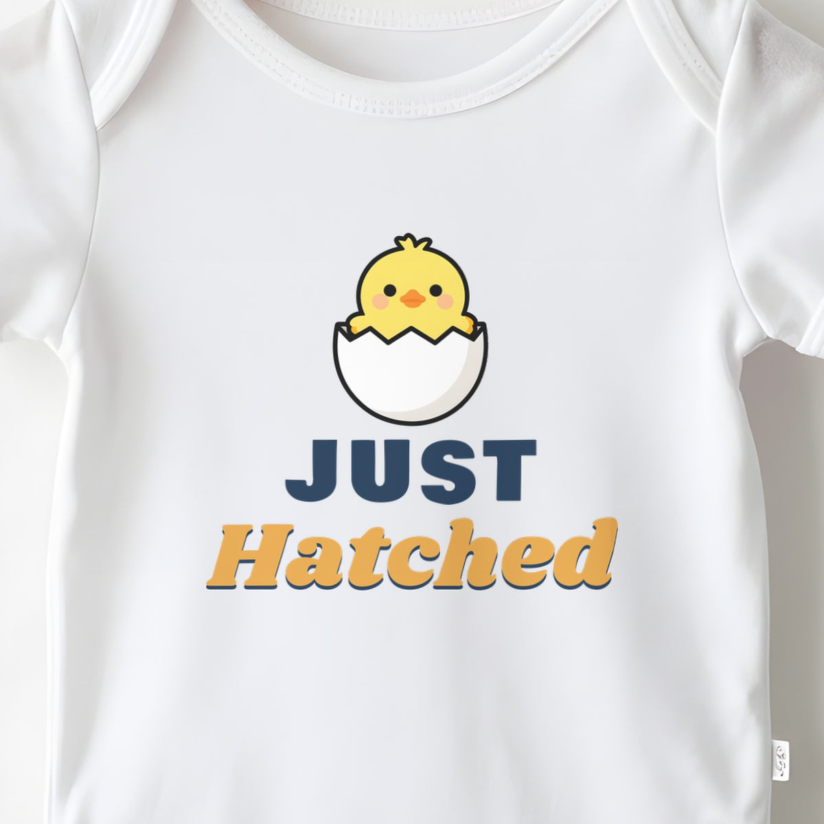 Just Hatched baby grow print close-up