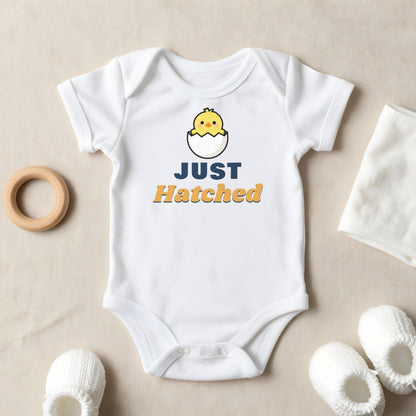 Just Hatched baby grow laid flat