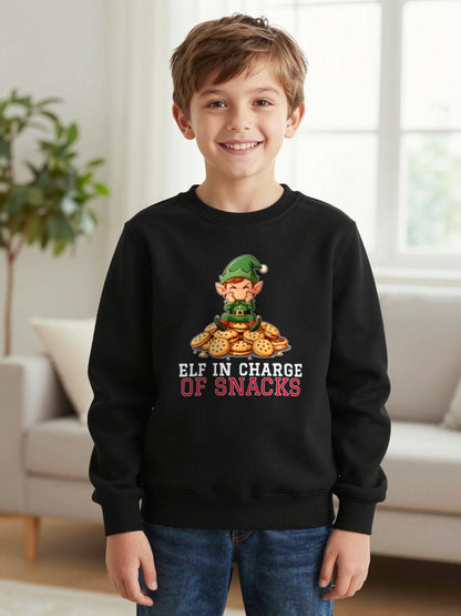 Kids Elf In Charge Of Snacks Christmas T-Shirt & Jumper worn by a child, another colour
